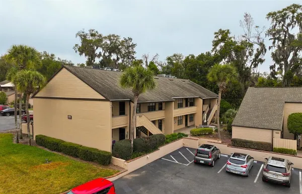 a view of a car in front of a house