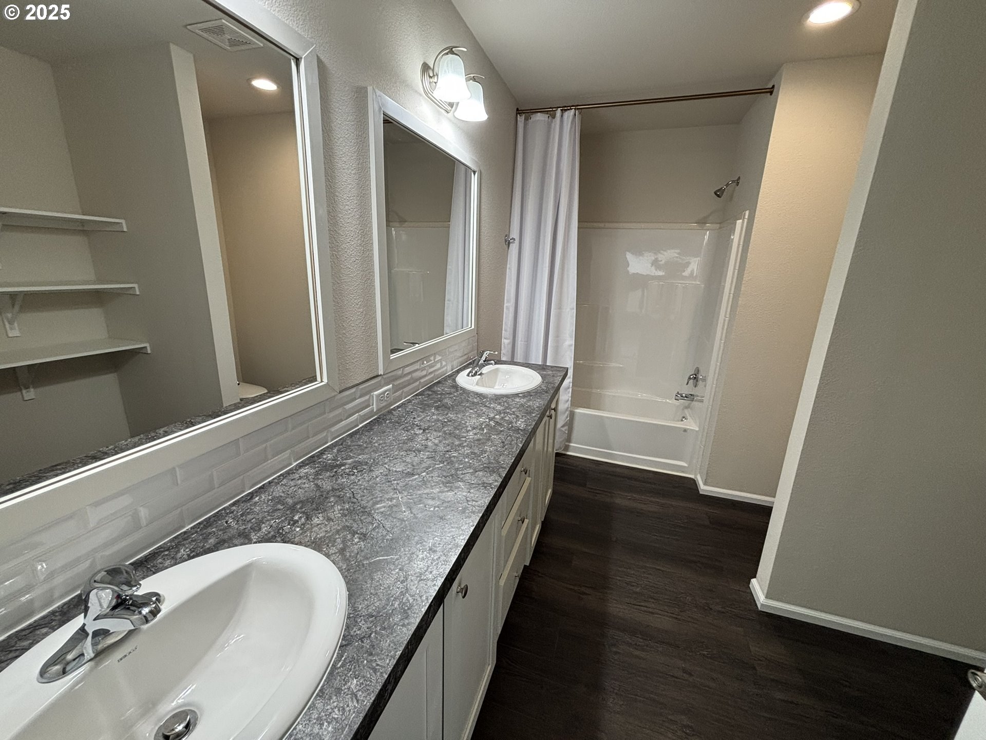 5270 Nopal Street Florence, OR 97439 - Photo 21 of 27 a bathroom with a granite countertop sink and a mirror