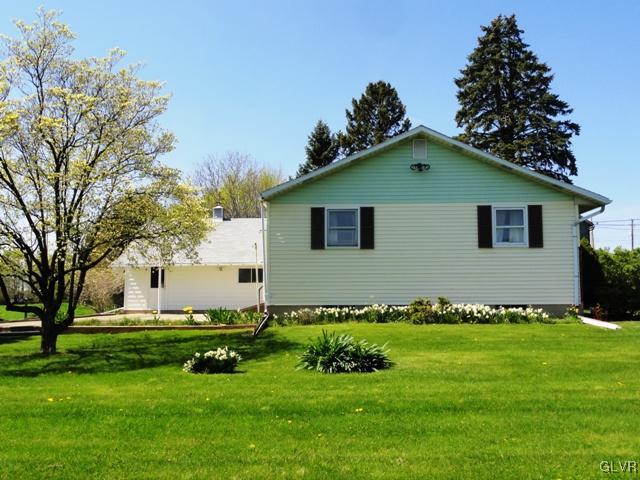 4541 Newburg Road Nazareth, PA 18064 - Photo 3 of 20 a front view of a house with a garden
