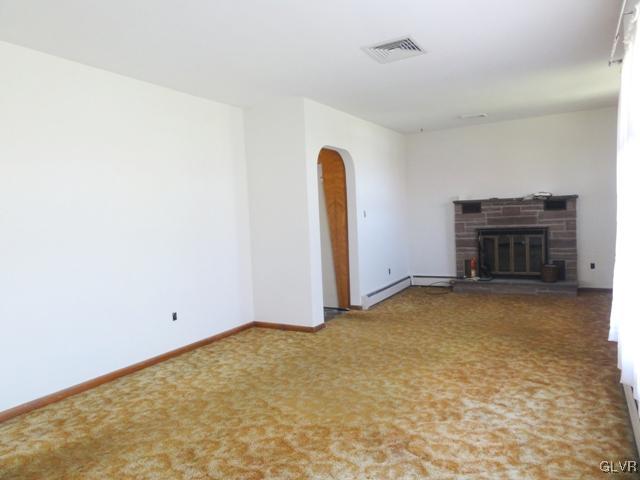 4541 Newburg Road Nazareth, PA 18064 - Photo 4 of 20 a view of an empty room with a fireplace