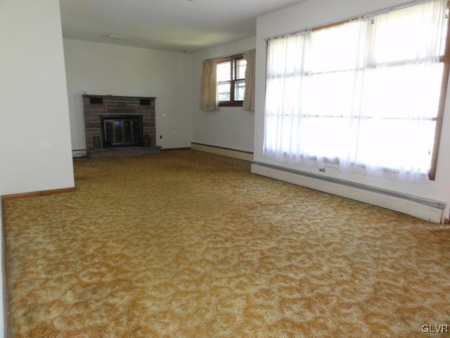 4541 Newburg Road Nazareth, PA 18064 - Photo 5 of 20 an empty room with a fireplace