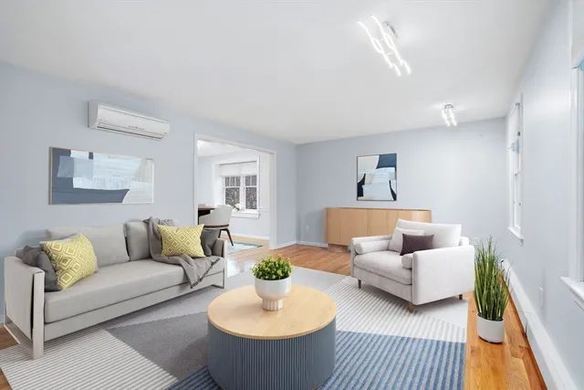 a living room with furniture and a couch