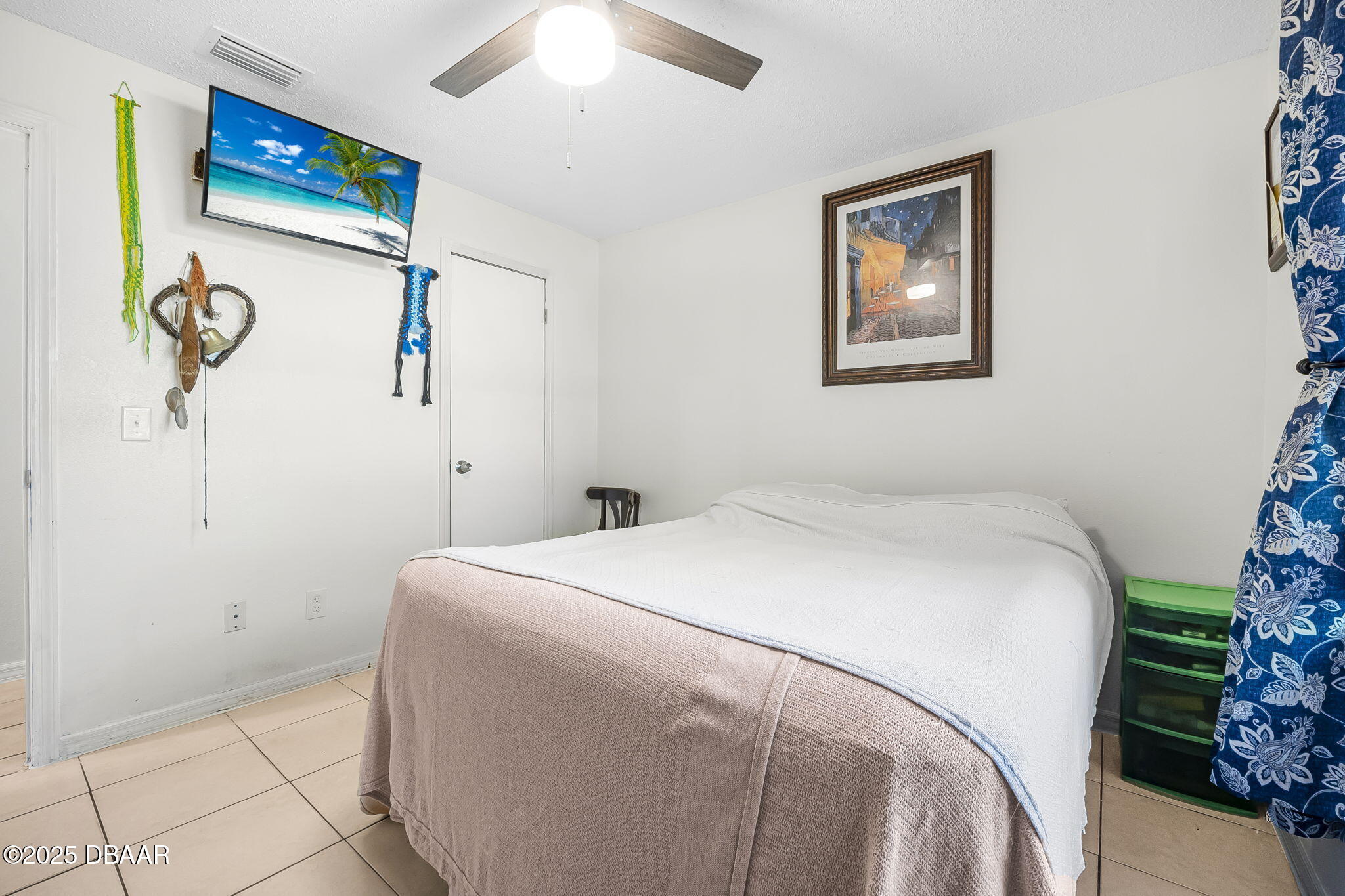 3228 Unity Tree Drive Edgewater, FL 32141 - Photo 18 of 37 a bedroom with a bed and a window