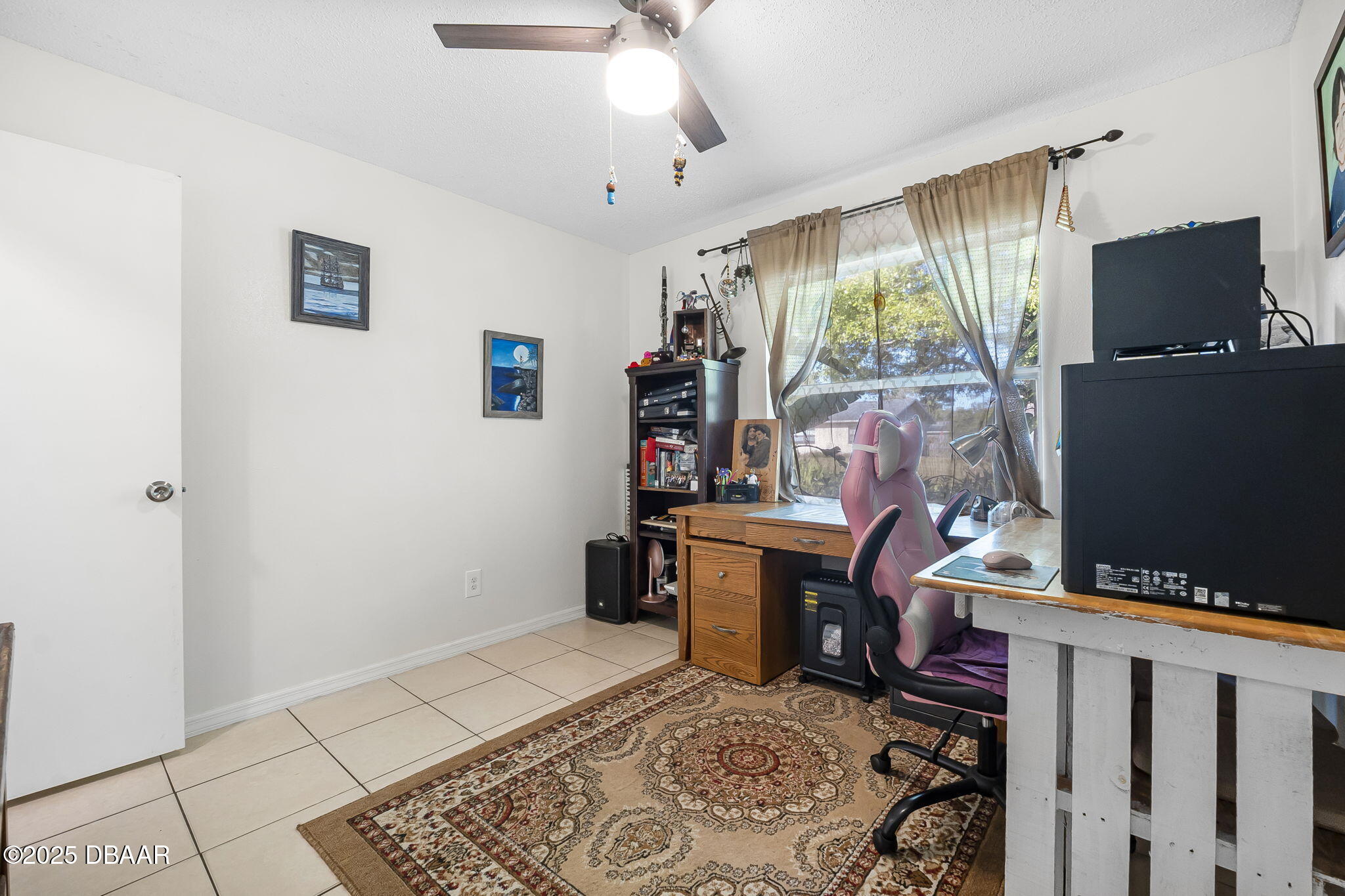 3228 Unity Tree Drive Edgewater, FL 32141 - Photo 21 of 37 a workspace with furniture and window