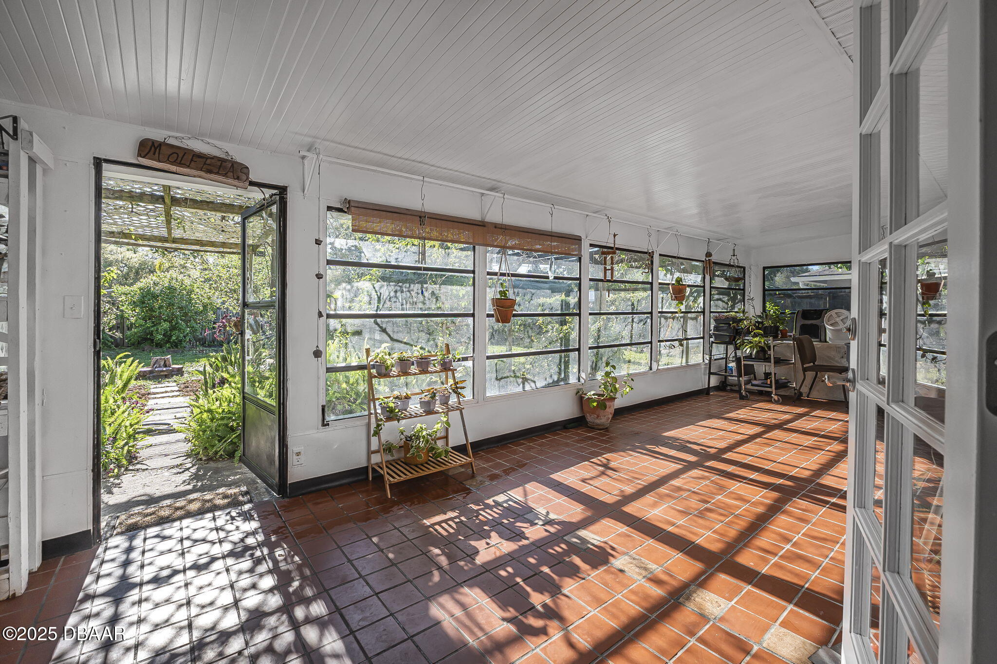 3228 Unity Tree Drive Edgewater, FL 32141 - Photo 24 of 37 a view of a room with racks on the wall