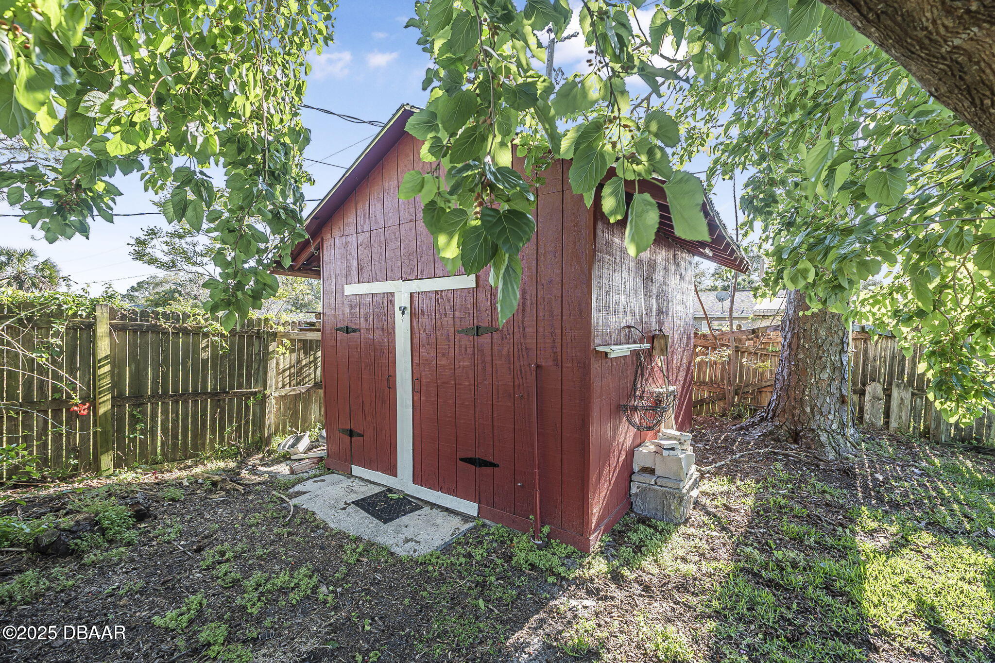 3228 Unity Tree Drive Edgewater, FL 32141 - Photo 26 of 37 a backyard of a house with lots of green space