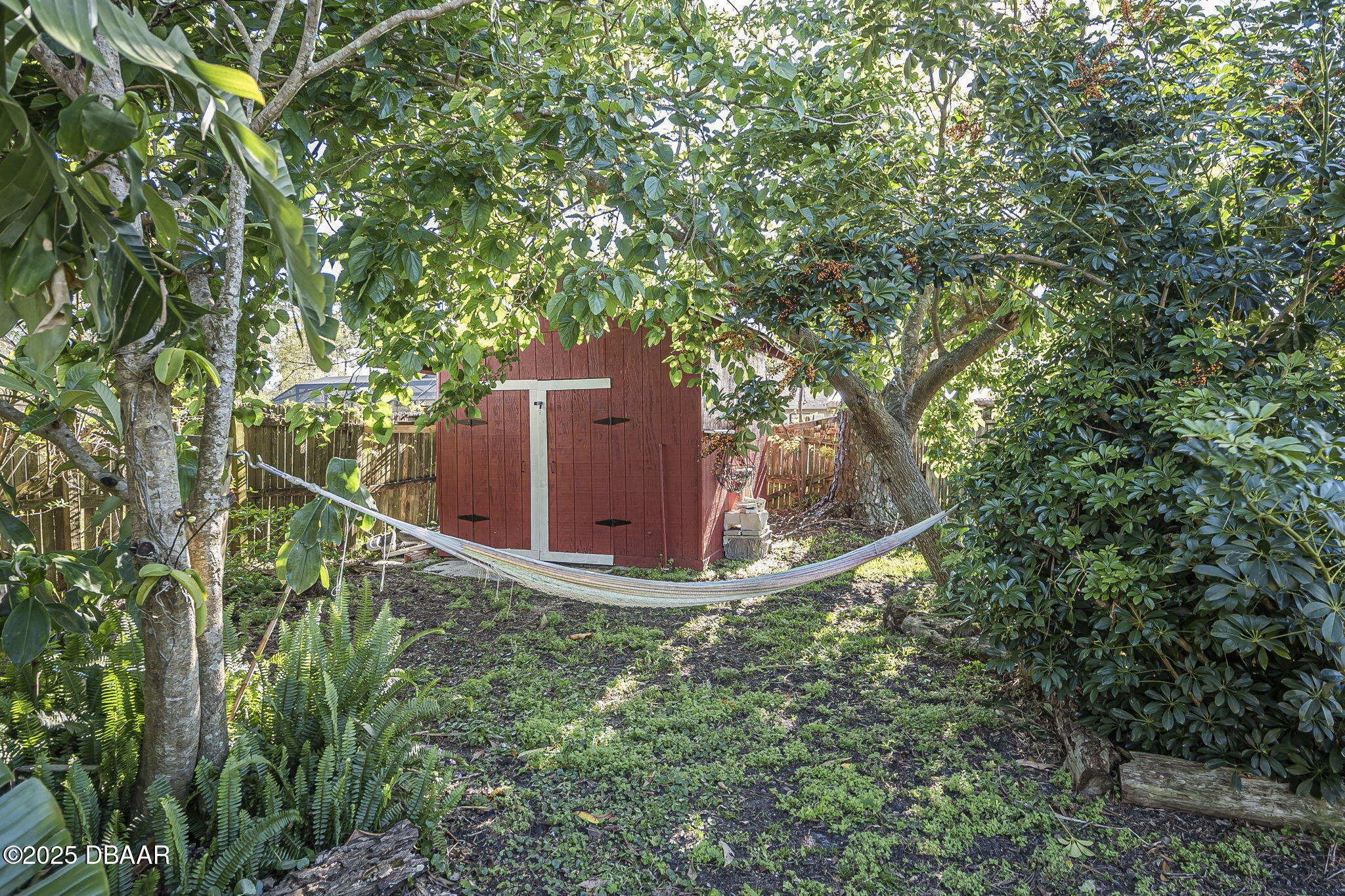 3228 Unity Tree Drive Edgewater, FL 32141 - Photo 27 of 37 a view of a wooden fence