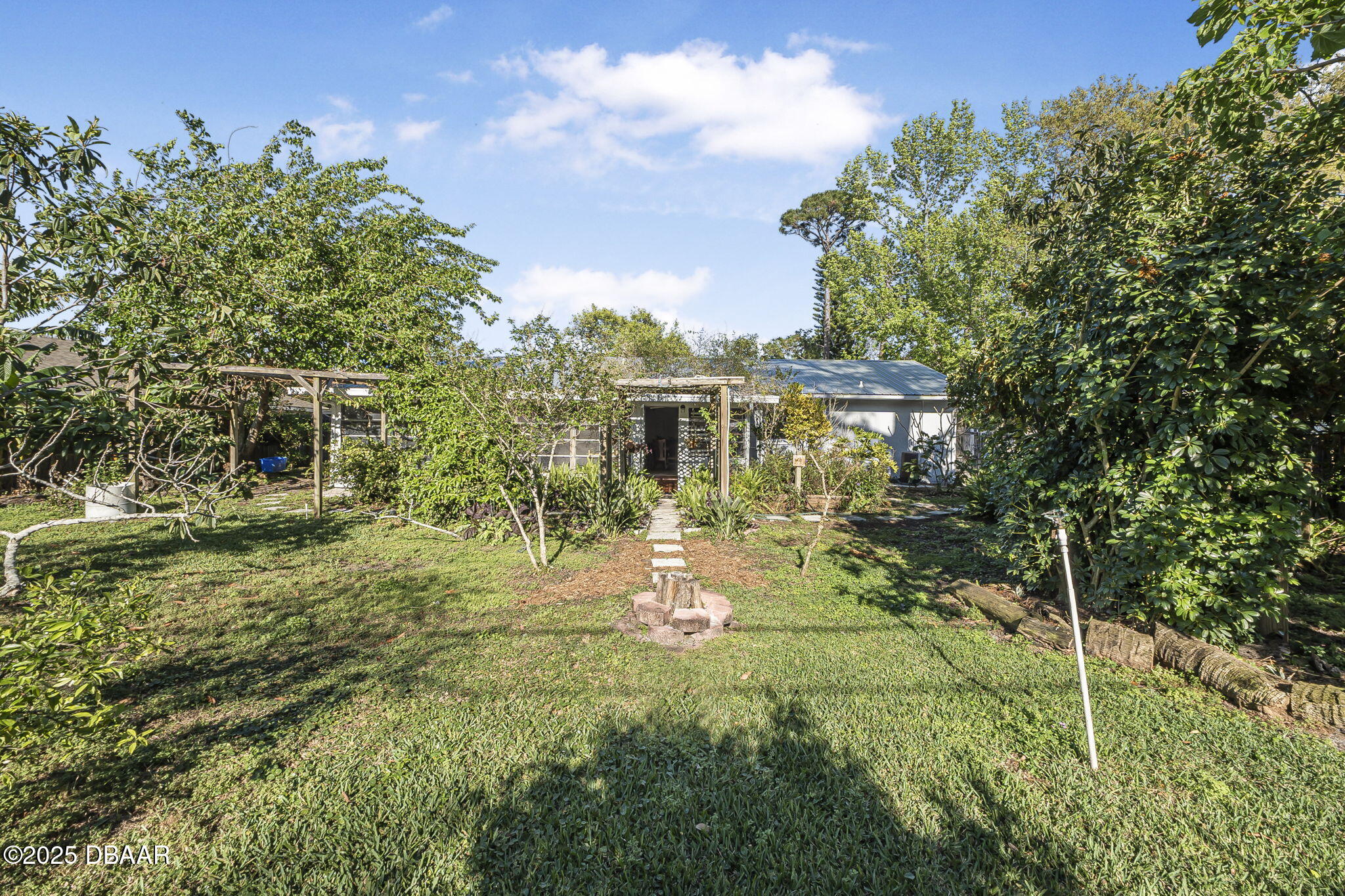 3228 Unity Tree Drive Edgewater, FL 32141 - Photo 30 of 37 a view of a house with a yard