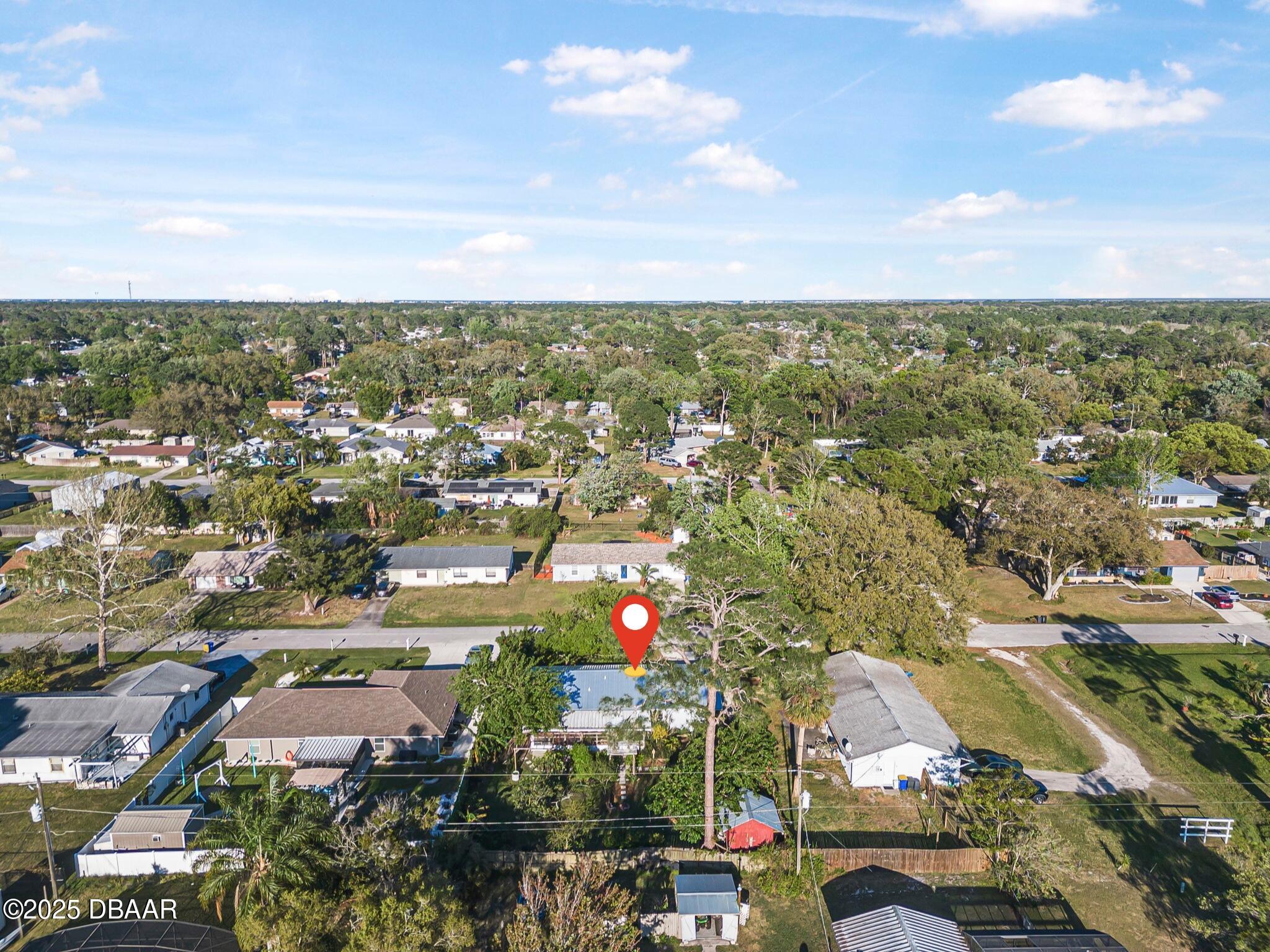 3228 Unity Tree Drive Edgewater, FL 32141 - Photo 34 of 37 an aerial view of city and green space