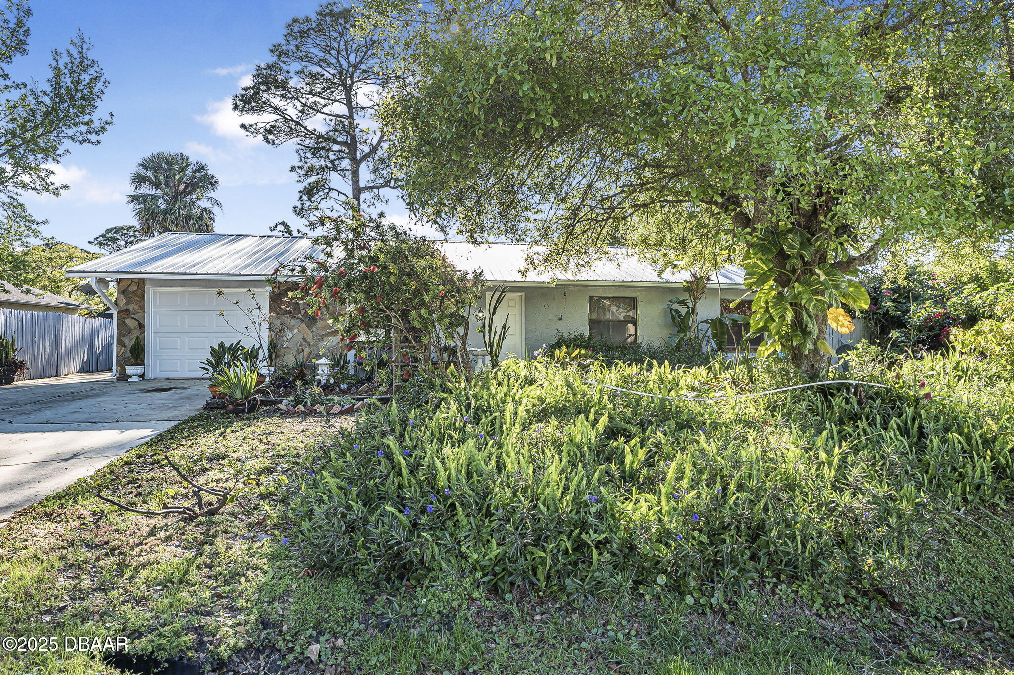 3228 Unity Tree Drive Edgewater, FL 32141 - Photo 37 of 37 a view of a house with a tree