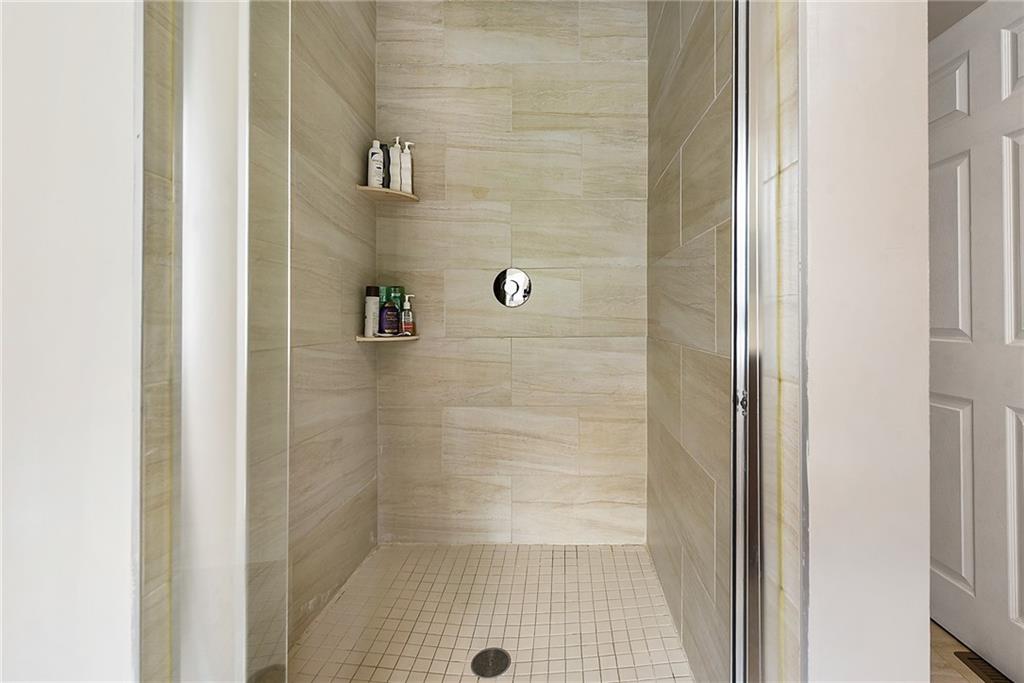 113 42nd Street Pittsburgh, PA 15201 - Photo 26 of 39 a bathroom with a shower