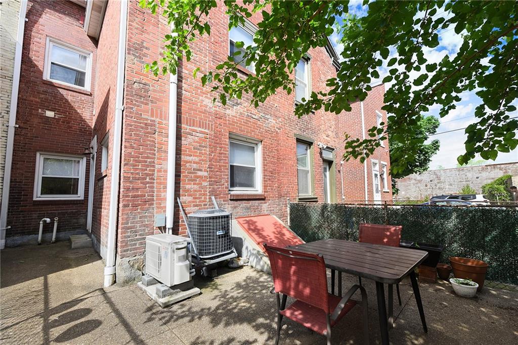 113 42nd Street Pittsburgh, PA 15201 - Photo 39 of 39 a backyard of a house with outdoor seating