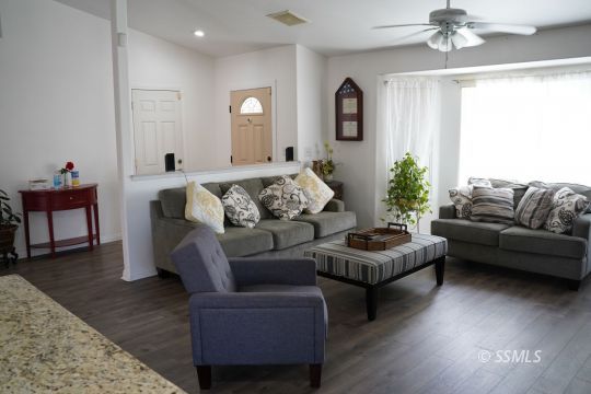 420 Christopher Court Ridgecrest, CA 93555 - Photo 11 of 32 a living room with furniture and a large window