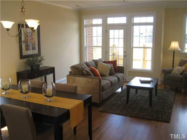 1532 Yarborough Park Drive Raleigh, NC 27604 - Photo 6 of 10 a living room with furniture and a window