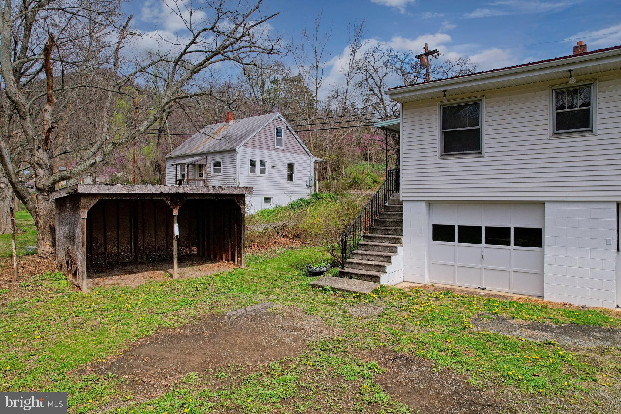 159 Rocket Center Road Keyser, WV 26726 - Photo 56 of 64 a view of a house with a yard and large tree