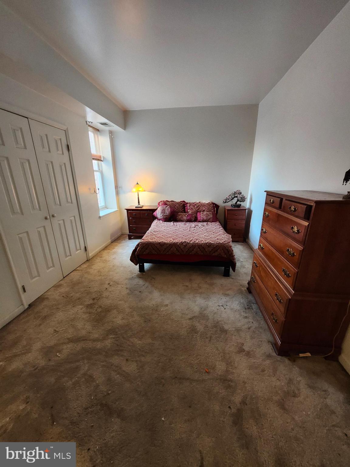 512 U Street Northwest, Unit 8 Washington, DC 20001 - Photo 7 of 9 a bedroom with bed and window