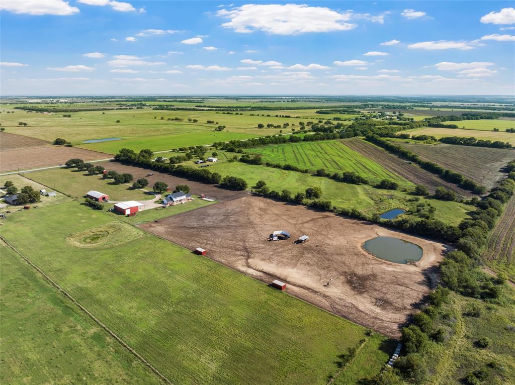 5112 Old Caufield Ranch Road McGregor, TX 76657 - Photo 36 of 38 Aerial view of sparsely populated area featuring farmland and a nearby body of water
