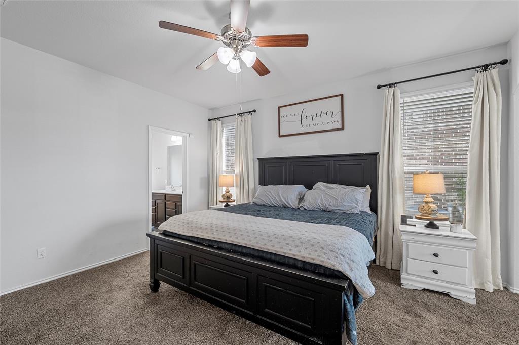 6201 Elephant Butte Drive Waco, TX 76708 - Photo 15 of 40 a bedroom with a bed and a window