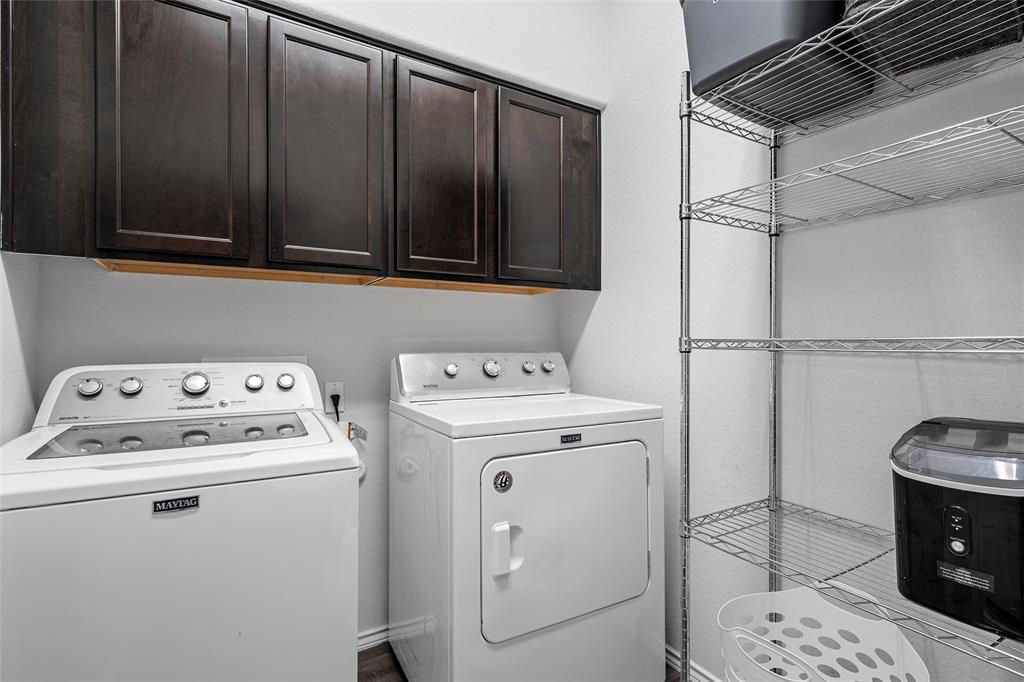 6201 Elephant Butte Drive Waco, TX 76708 - Photo 29 of 40 a utility room with dryer and washer