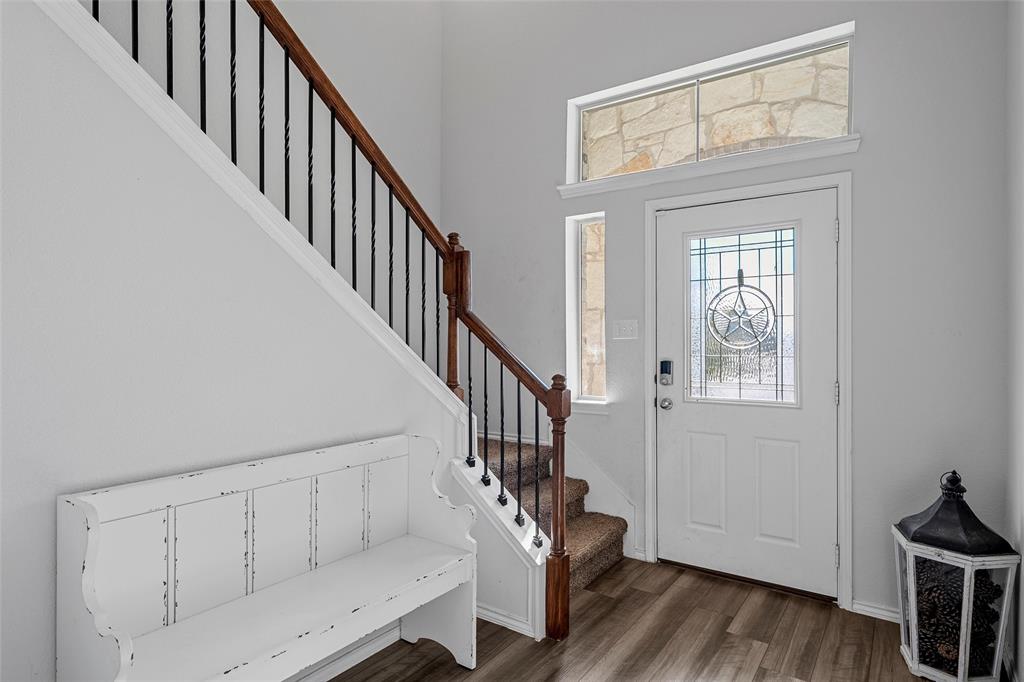 6201 Elephant Butte Drive Waco, TX 76708 - Photo 3 of 40 a view of entryway and hall with wooden floor