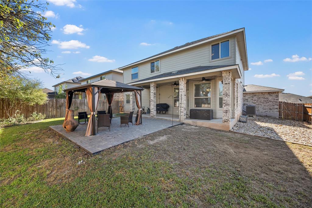 6201 Elephant Butte Drive Waco, TX 76708 - Photo 34 of 40 a view of a house with a patio and a backyard