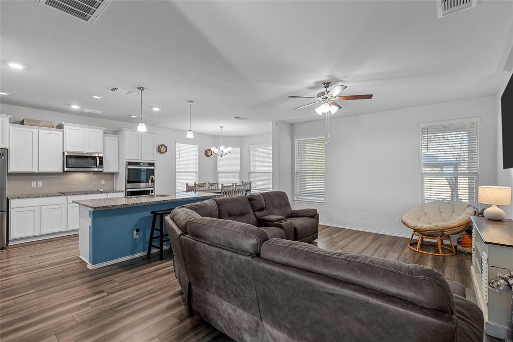 6201 Elephant Butte Drive Waco, TX 76708 - Photo 4 of 40 a living room with furniture and kitchen view