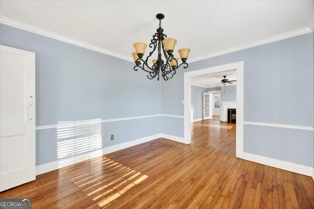 a view of a house with a yard and plants