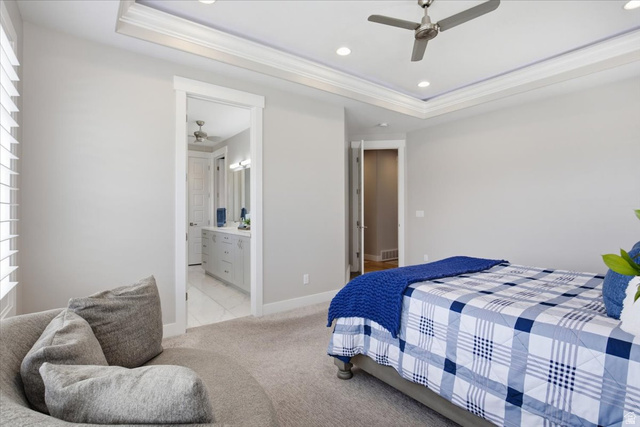 21 Pier Place Tooele, UT 84074 - Photo 34 of 112 Spacious room with tray ceiling, recessed lighting, and a ceiling fan