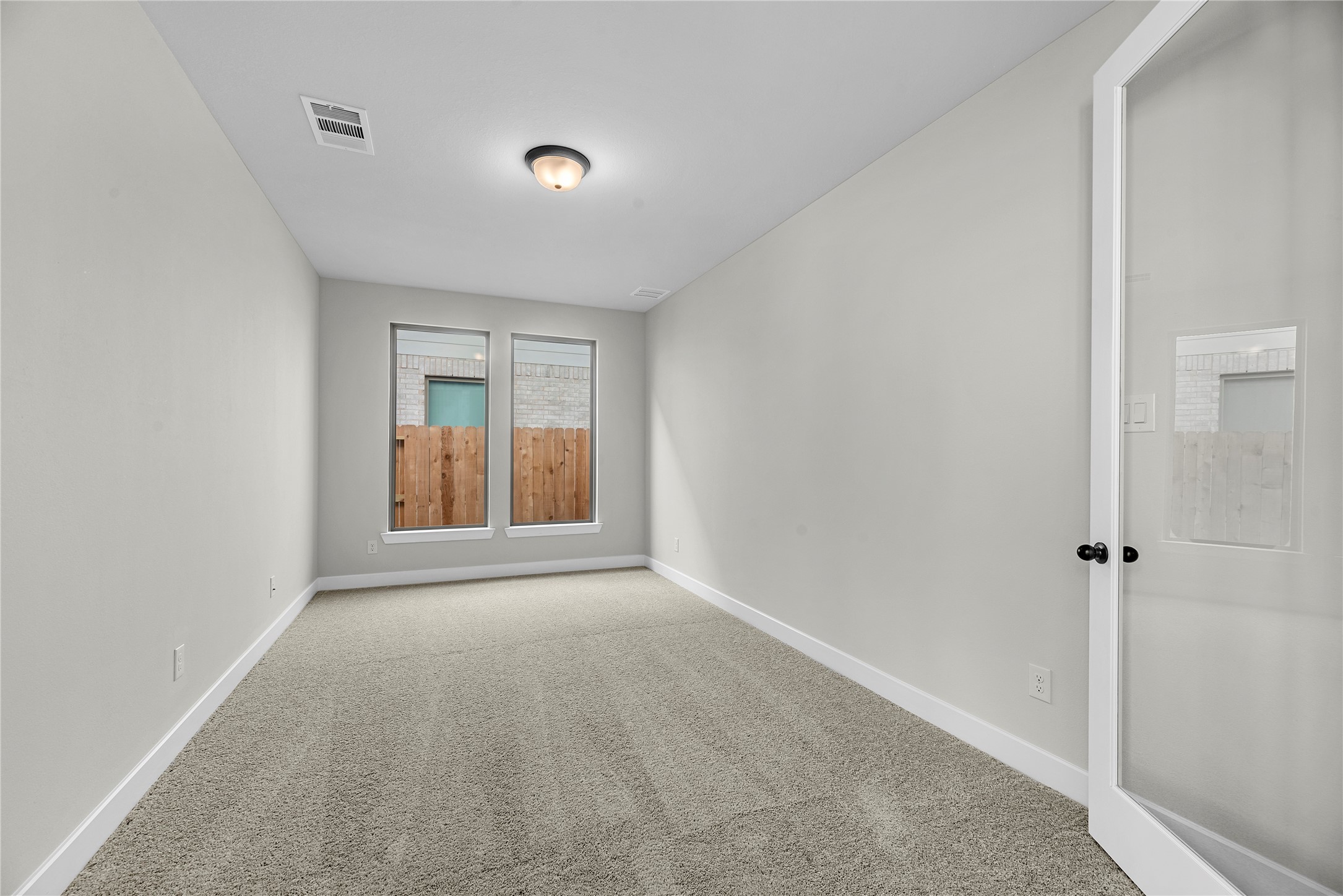 30927 Spring Lily Way Brookshire, TX 77423 - Photo 13 of 28 a view of an empty room with window
