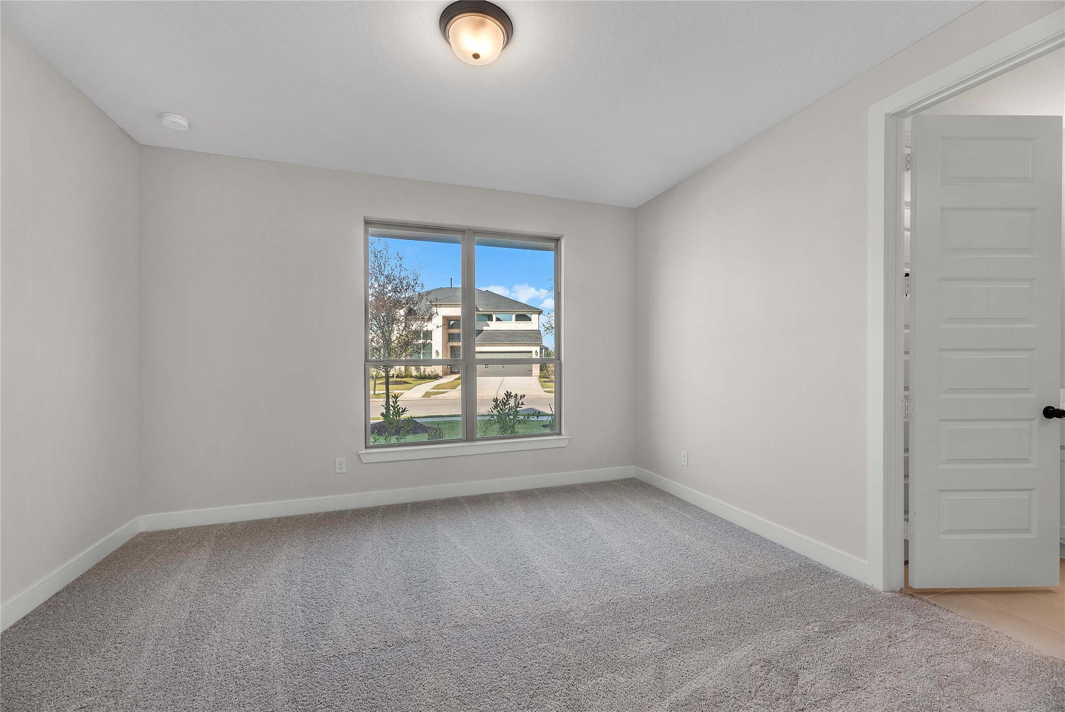 30927 Spring Lily Way Brookshire, TX 77423 - Photo 14 of 28 an empty room with a window