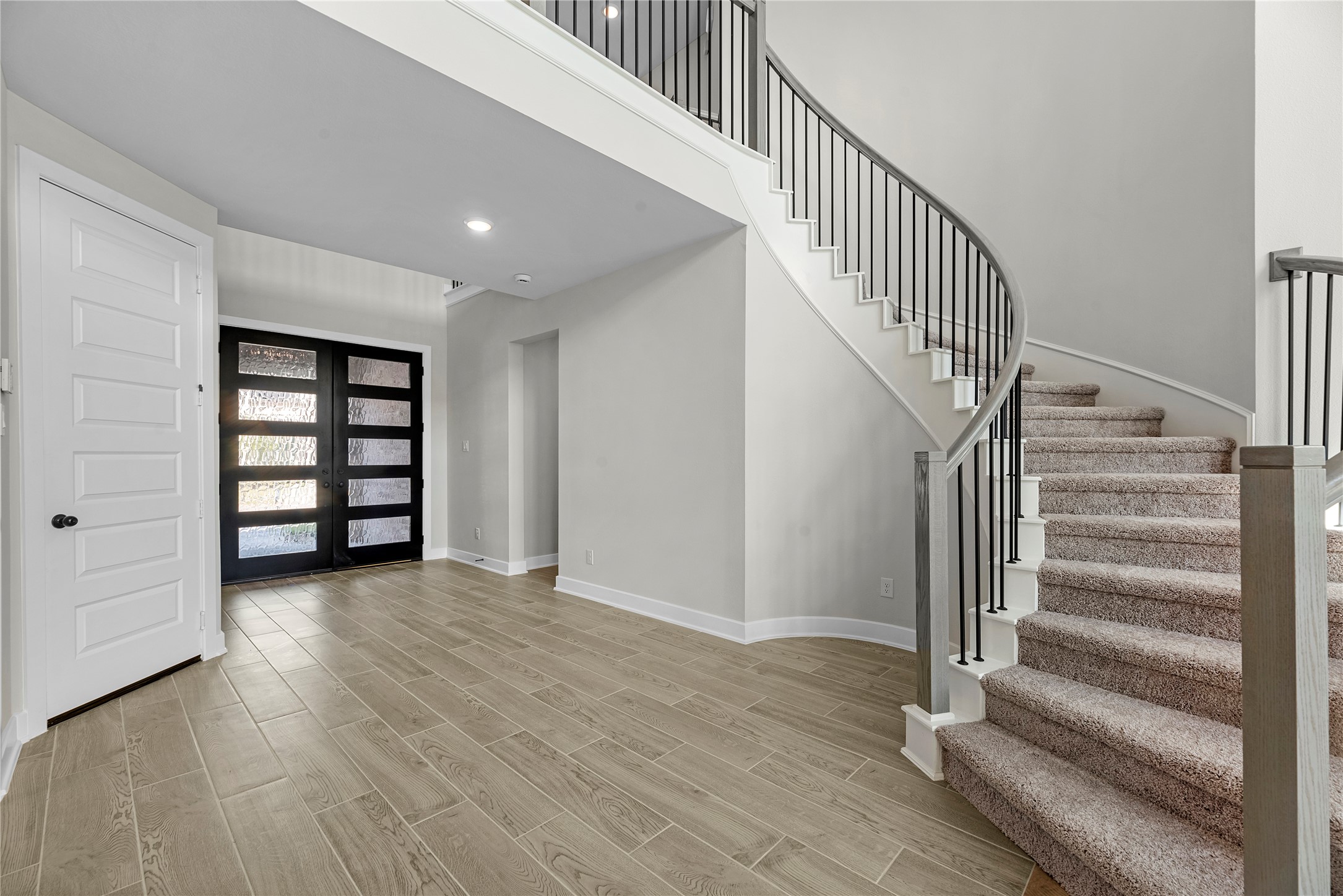 30927 Spring Lily Way Brookshire, TX 77423 - Photo 16 of 28 a view of entryway with wooden floor