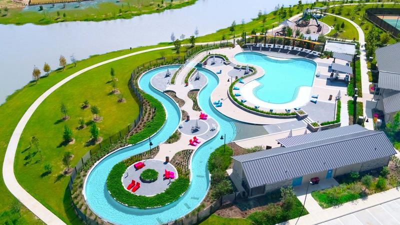 30927 Spring Lily Way Brookshire, TX 77423 - Photo 28 of 28 an aerial view of a swimming pool with a yard and plants