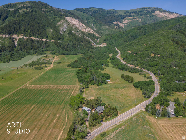 2807 North Ogden Canyon Road Eden, UT 84310 - Photo 61 of 72 Expansive mountainous landscape featuring lush green foliage and agricultural fields