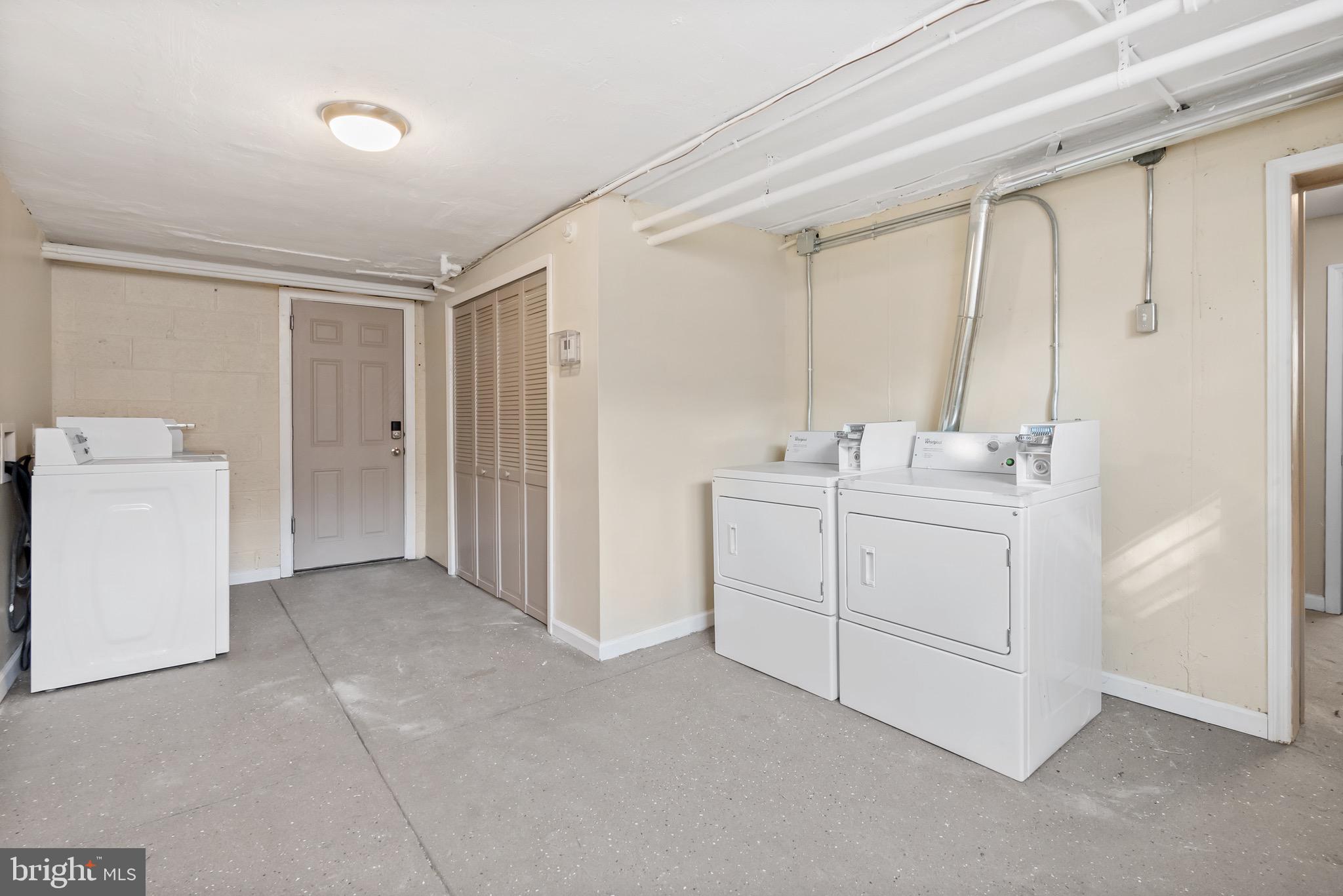 5160 D Street, Unit 2 Philadelphia, PA 19120 - Photo 16 of 23 a view of a utility room with closet dryer and washer