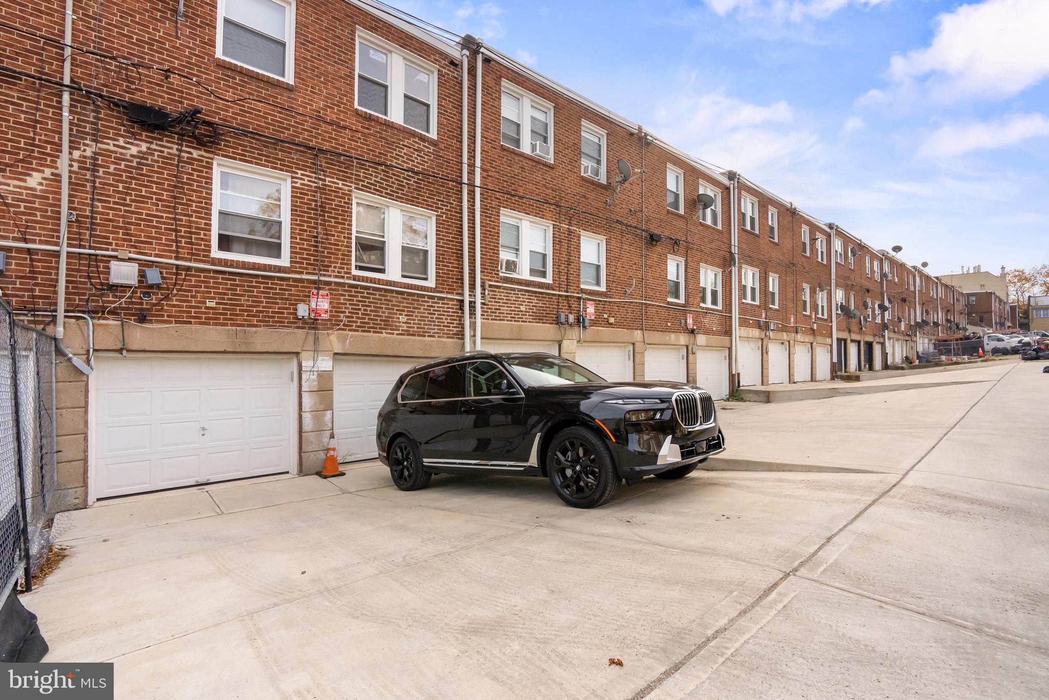 5160 D Street, Unit 2 Philadelphia, PA 19120 - Photo 17 of 23 a car parked in front of a building