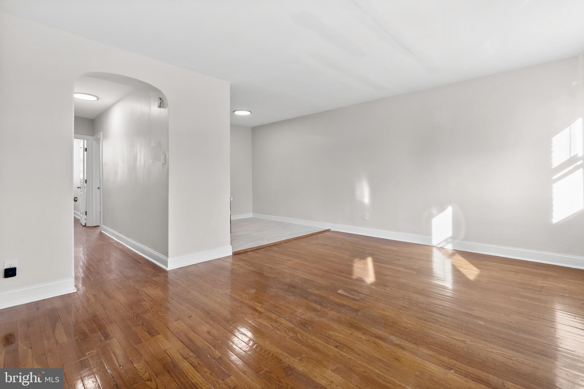 5160 D Street, Unit 2 Philadelphia, PA 19120 - Photo 2 of 23 a view of an empty room and wooden floor
