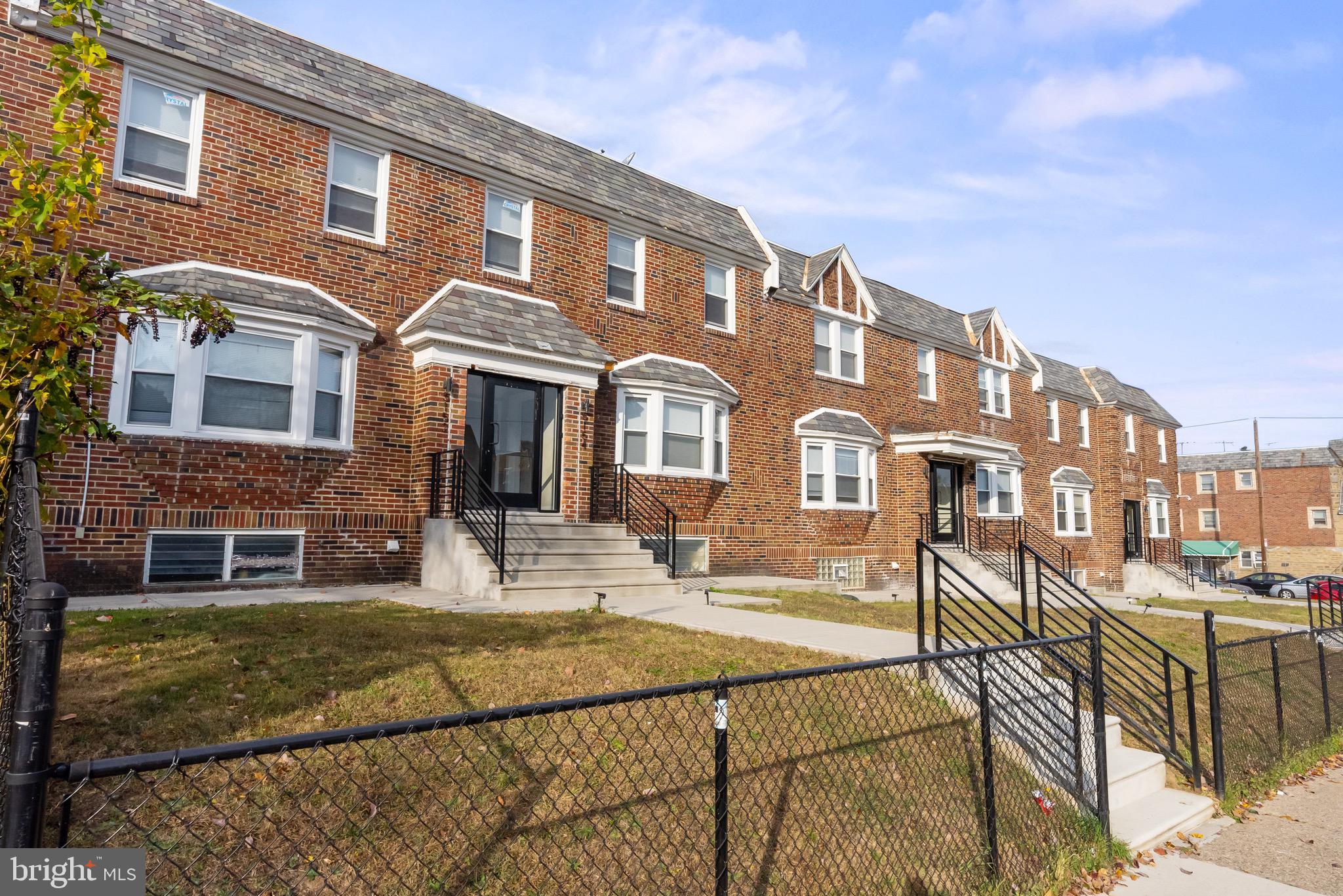 5160 D Street, Unit 2 Philadelphia, PA 19120 - Photo 23 of 23 a front view of a building with garden