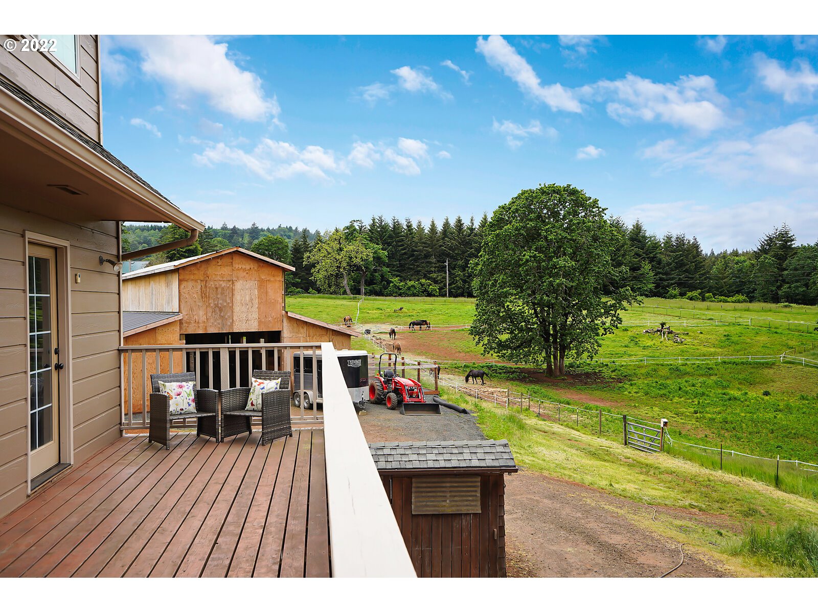 14997 Orchard Knob Road Dallas, OR 97338 - Photo 25 of 32 a terrace of a house with outdoor seating