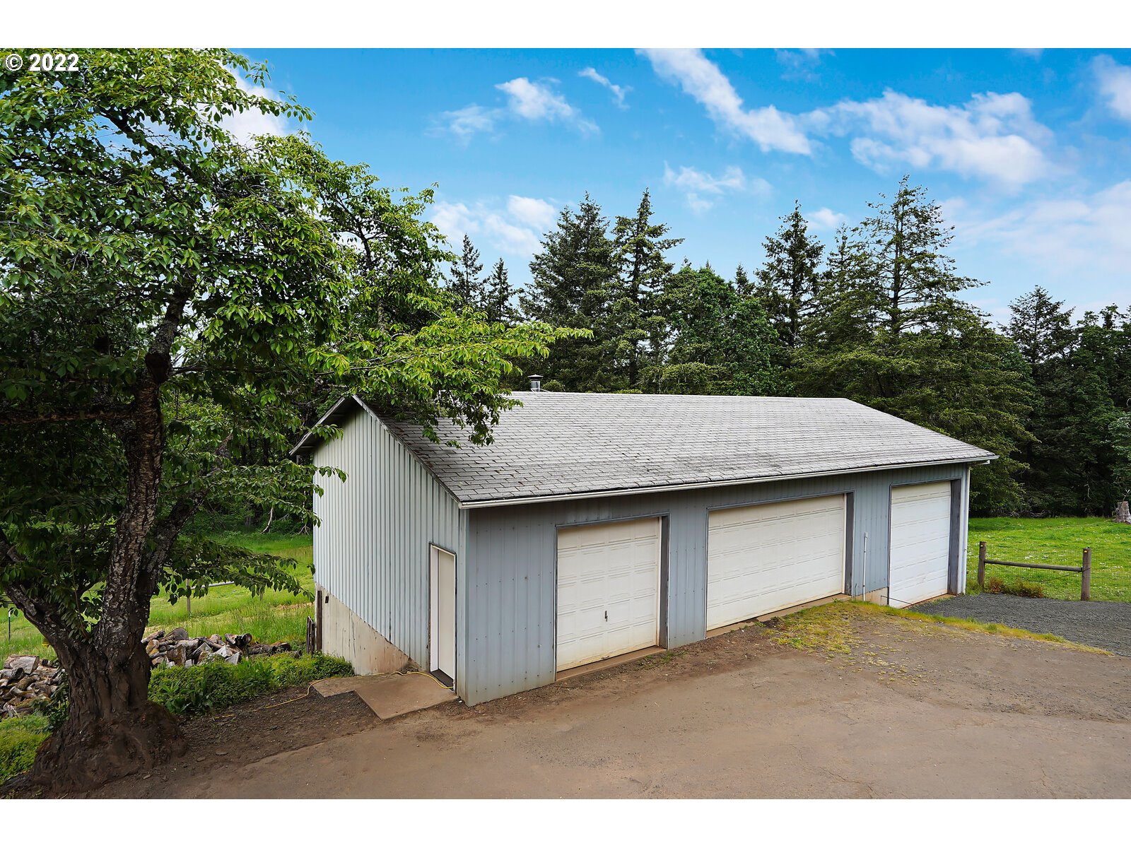 14997 Orchard Knob Road Dallas, OR 97338 - Photo 26 of 32 a aerial view of a house with a yard and garage