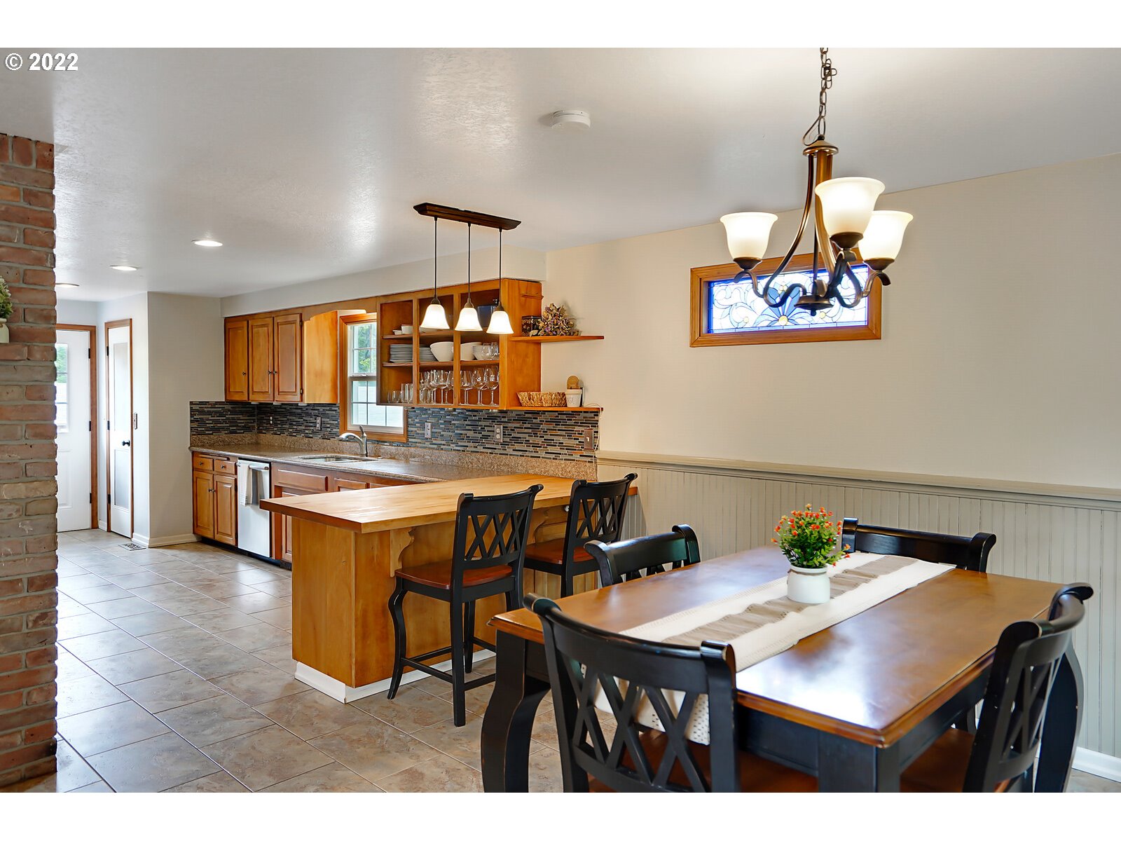 14997 Orchard Knob Road Dallas, OR 97338 - Photo 3 of 32 a view of a dining room with furniture and wooden floor