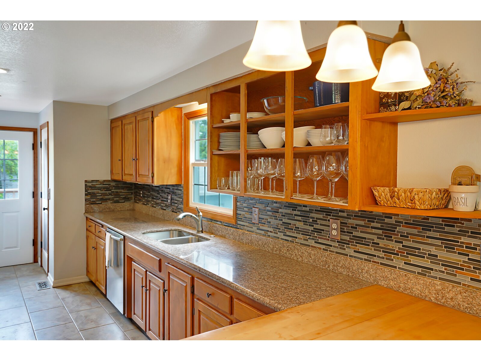 14997 Orchard Knob Road Dallas, OR 97338 - Photo 7 of 32 a kitchen with a sink and a large window