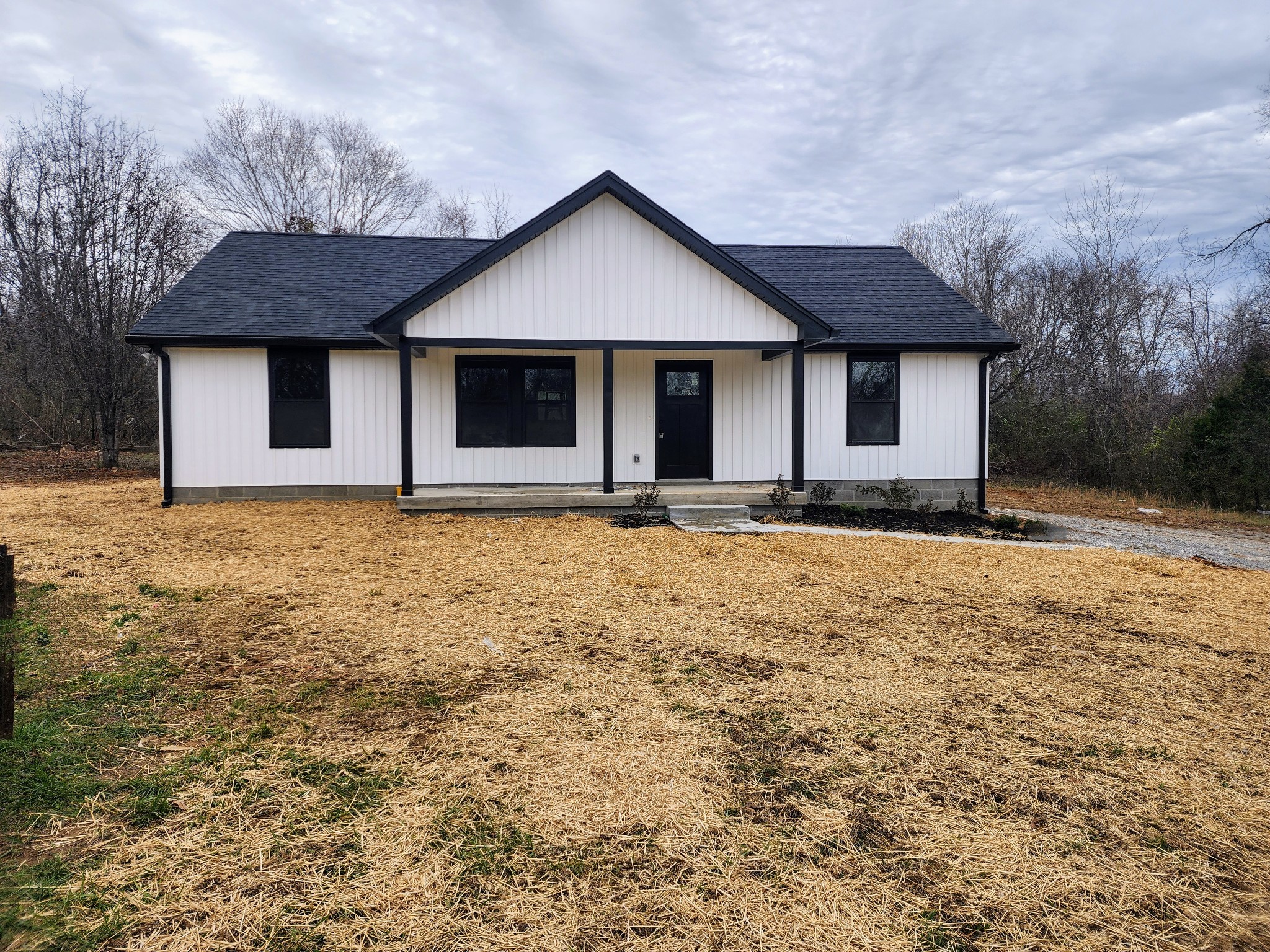 2006 Errel Dowlen Road Pleasant View, TN 37146 - Photo 1 of 15 a front view of a house with yard