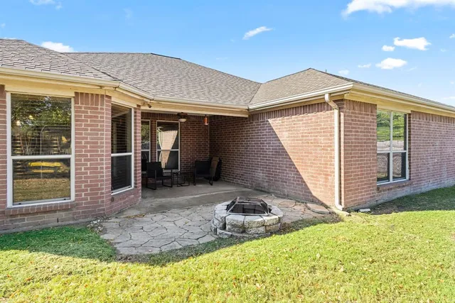 a house view with a garden space