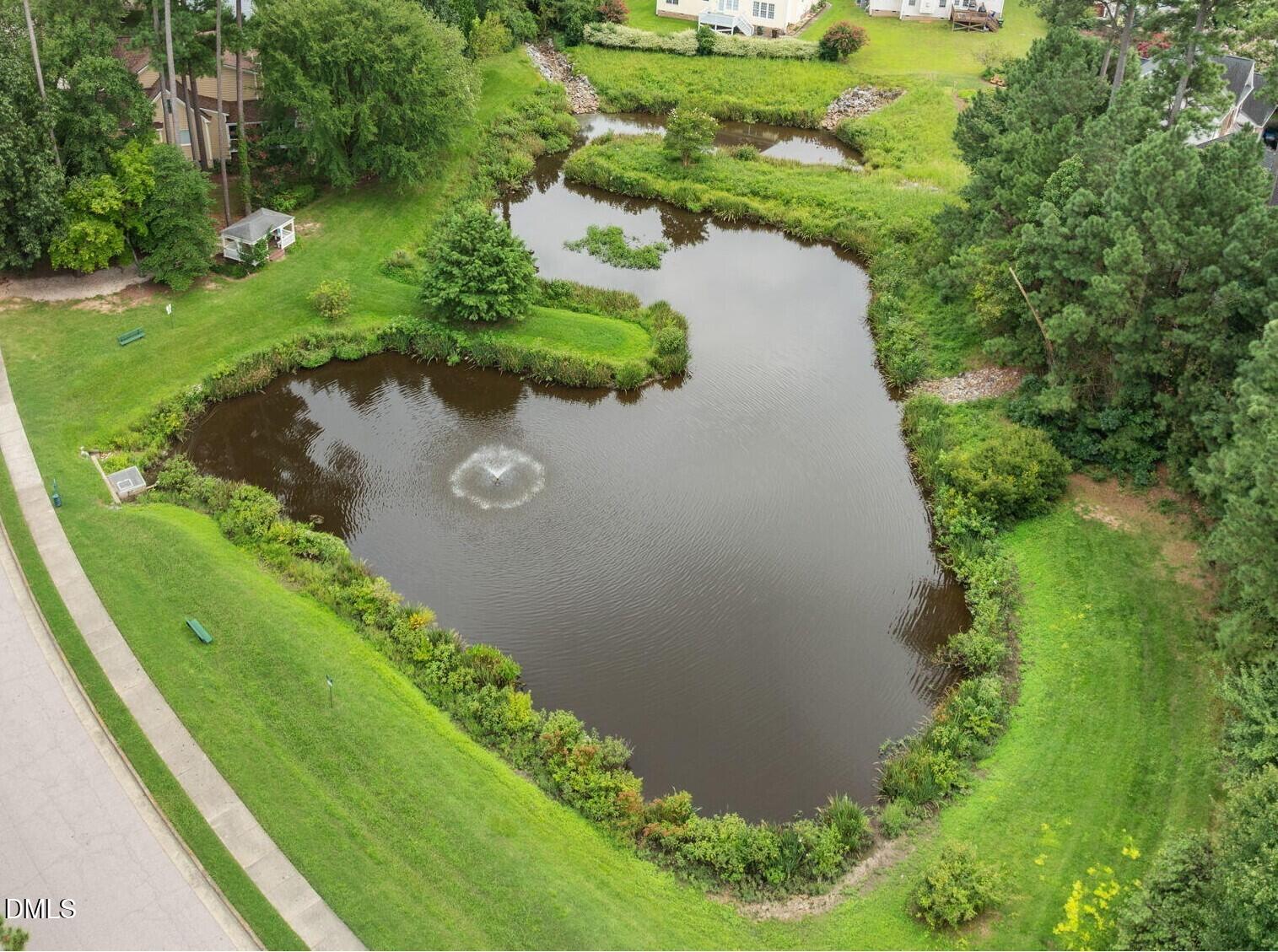 6 Upton Court Durham, NC 27713 - Photo 39 of 49 an aerial view of a golf course with a lake view