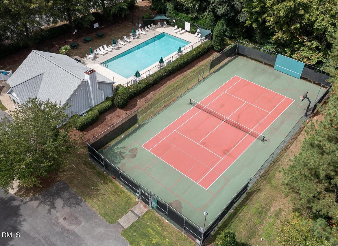 6 Upton Court Durham, NC 27713 - Photo 40 of 49 an aerial view of a tennis ground with a large swimming pool