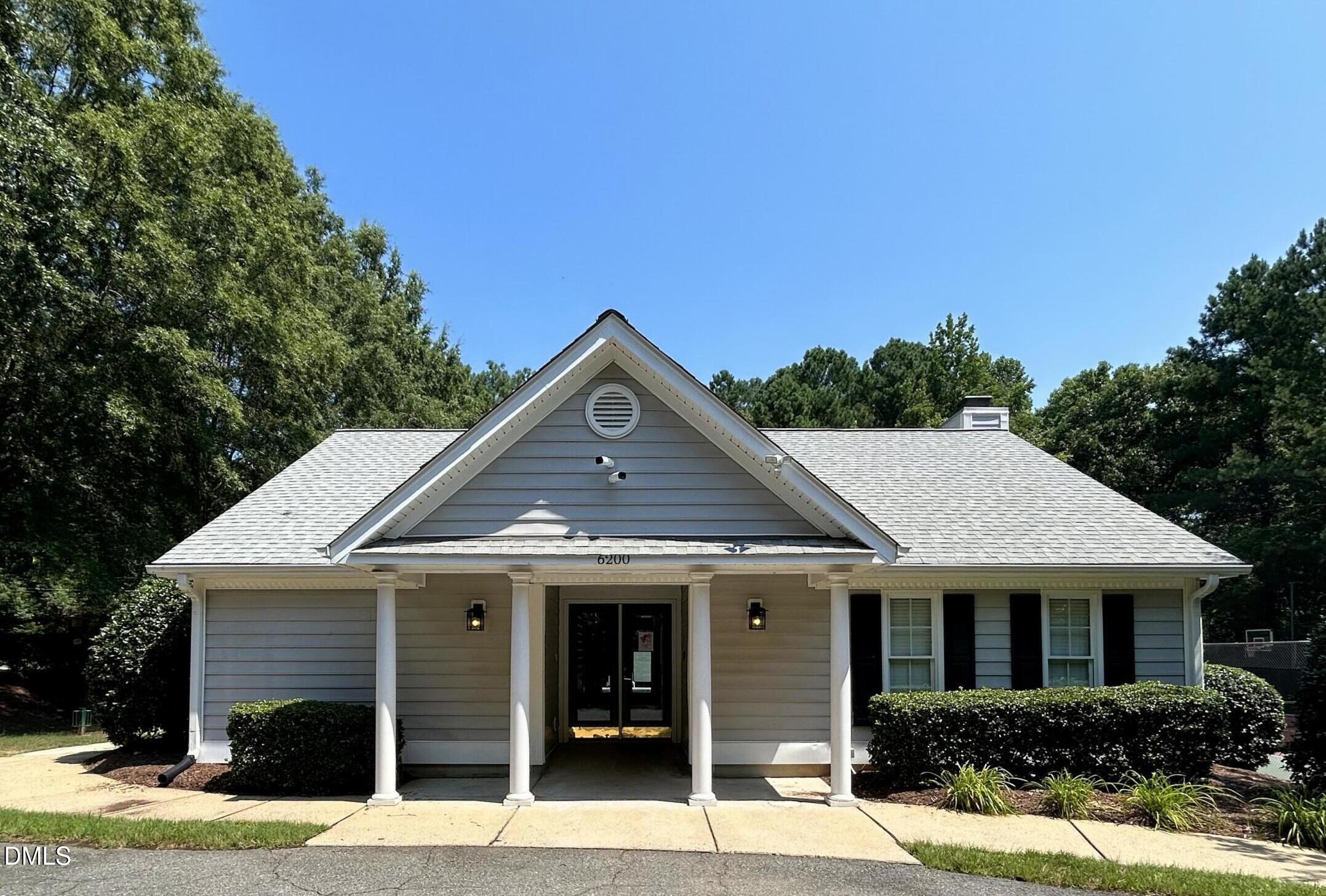 6 Upton Court Durham, NC 27713 - Photo 42 of 49 a front view of a house with a yard