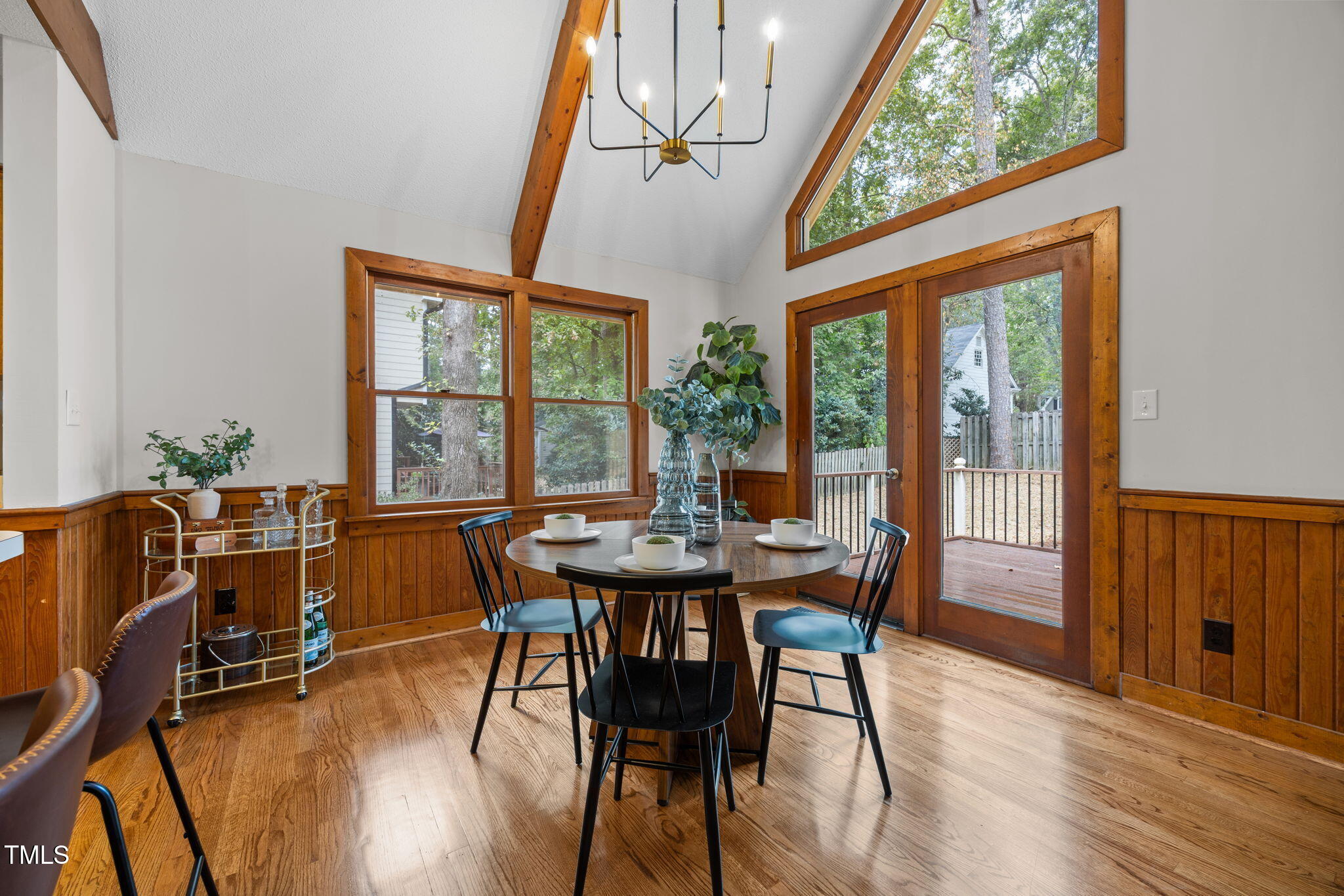 2508 Village Grove Road Raleigh, NC 27613 - Photo 10 of 36 a view of a dining room with furniture window and outside view