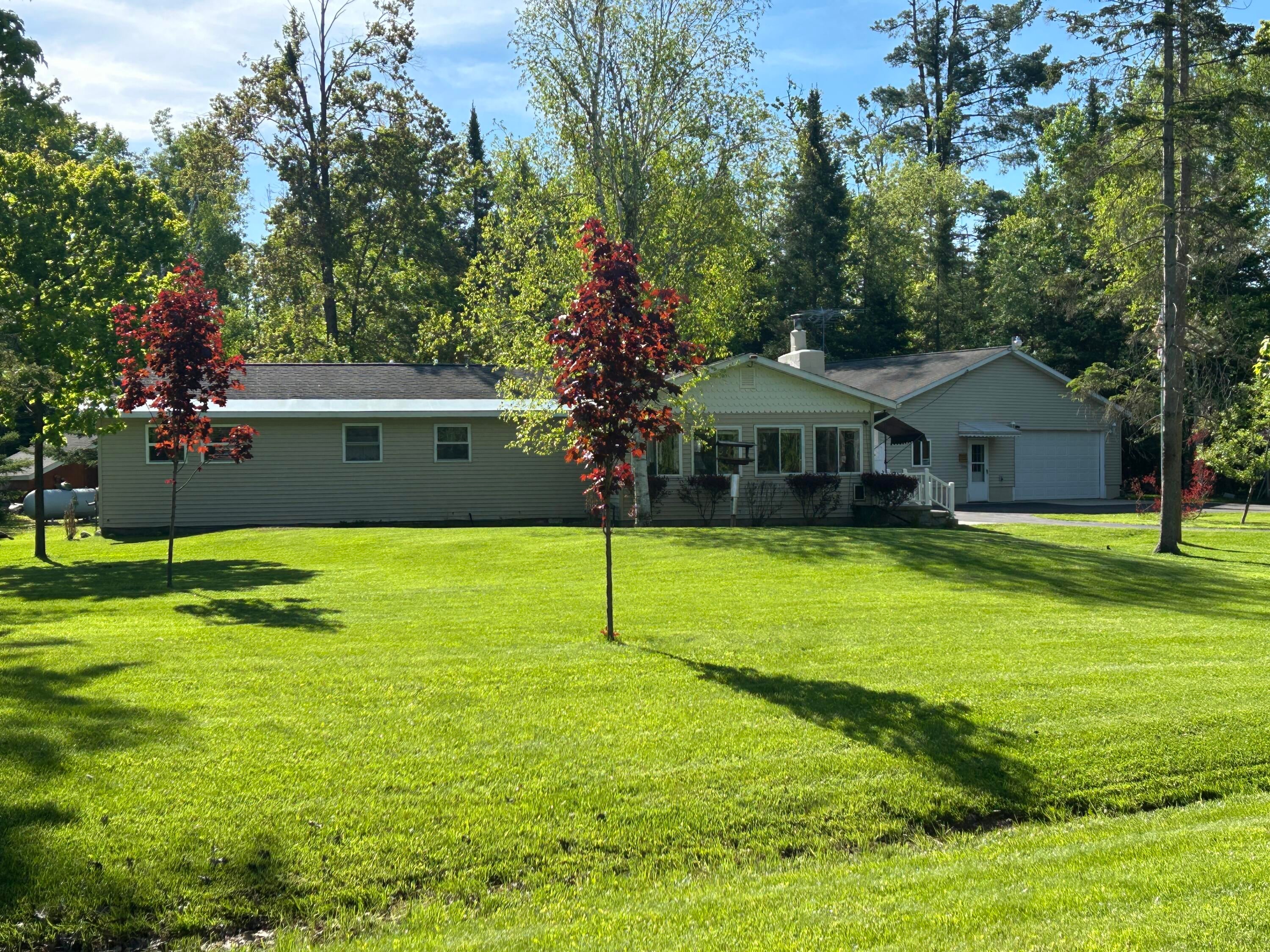177 Hawks Road Lachine, MI 49753 - Photo 30 of 36 Exterior House and Garage