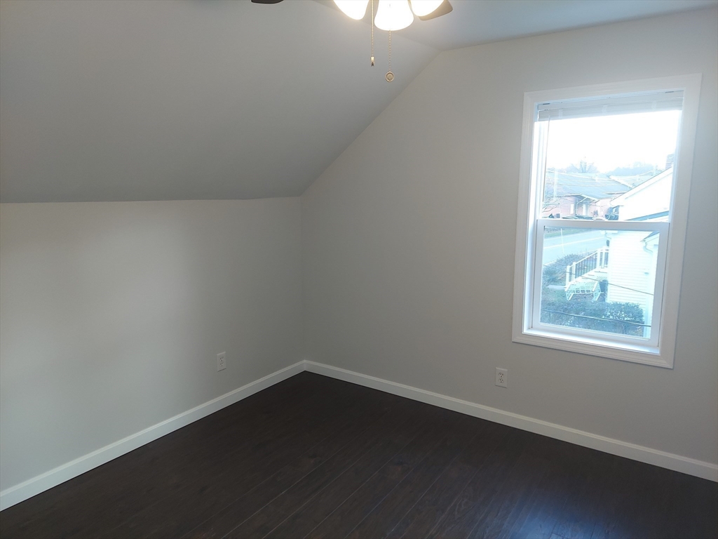 8 Phillips Street Attleboro, MA 02703 - Photo 11 of 17 an empty room with a window