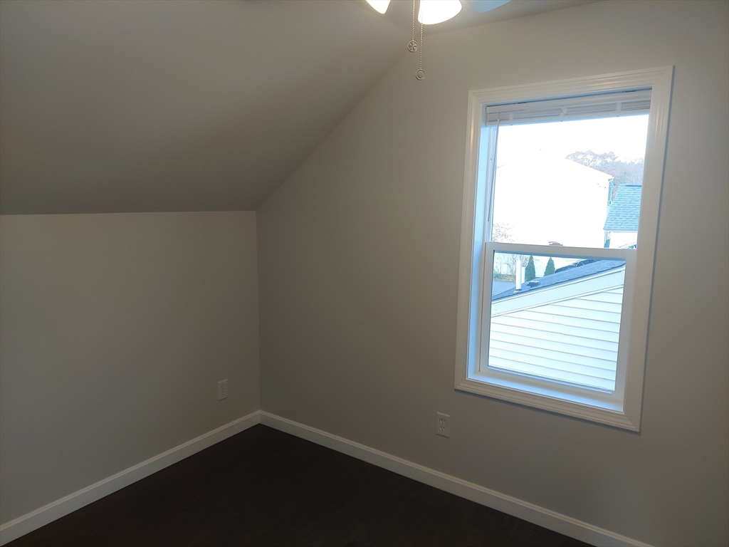 8 Phillips Street Attleboro, MA 02703 - Photo 12 of 17 an empty room with a window